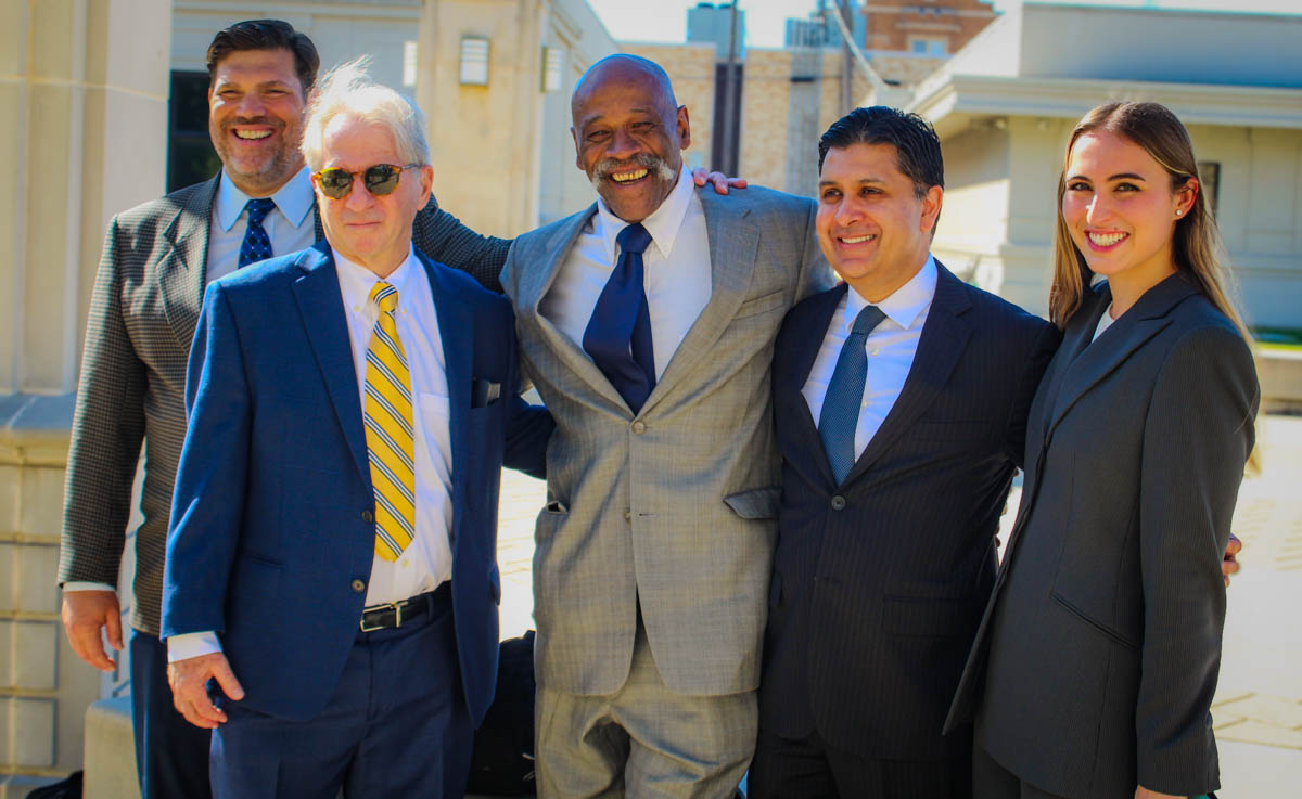Joseph Norwood, national Innocence Project co-founder Barry Scheck, exoneree and Norwood.Law client Perry James Lott, and Adnan Sultan and Cecily Burge of the national Innocence Project.